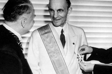 Henry Ford receiving the Grand Cross of the German Eagle from Nazi officials, 1938