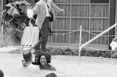 Motel manager pouring acid in the water when black people swam in his pool, 1964