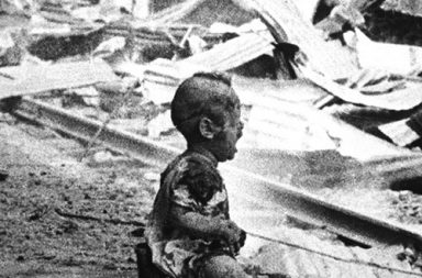 Bloody Saturday - a crying Chinese baby amid the bombed-out ruins of Shanghai's South Railway Station, 1937