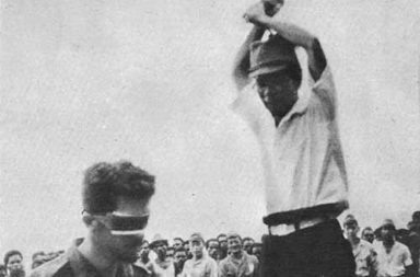 Leonard Siffleet about to be beheaded with a sword by a Japanese soldier, 1943