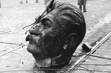 A disembodied statue of Joseph Stalin's head on the streets of Budapest during the Hungarian Revolution, 1956