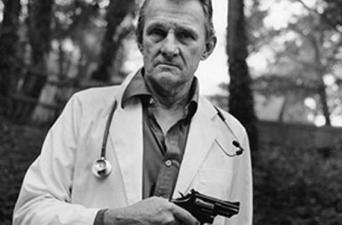 Dr. John Britton with the .357 Magnum he carried for protection when visiting the Pensacola Ladies’ Centre to perform abortions, 1993