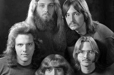 Romantic men’s hairstyle from the 1960s–1970s